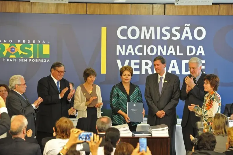 President Dilma Rousseff, a survivor of dictatorship-era torture, receives the final report from the National Truth Commission in 2014