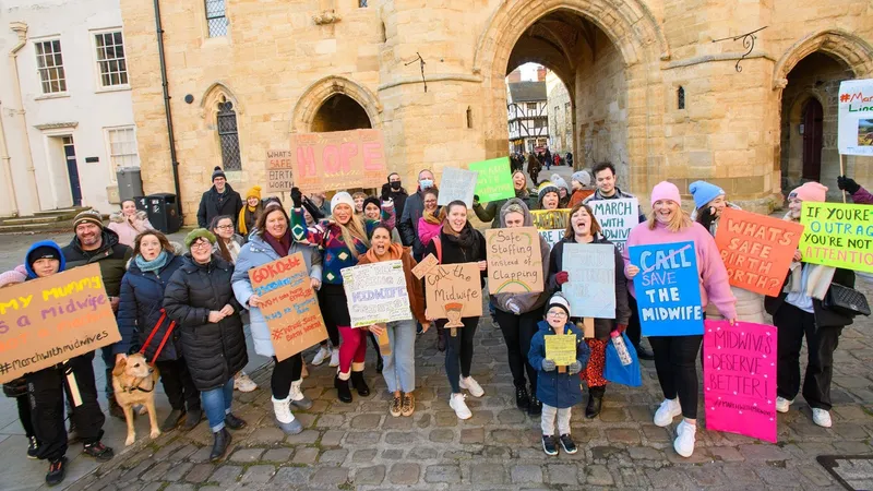 Midwives and campaigners by Lincoln Cathedral