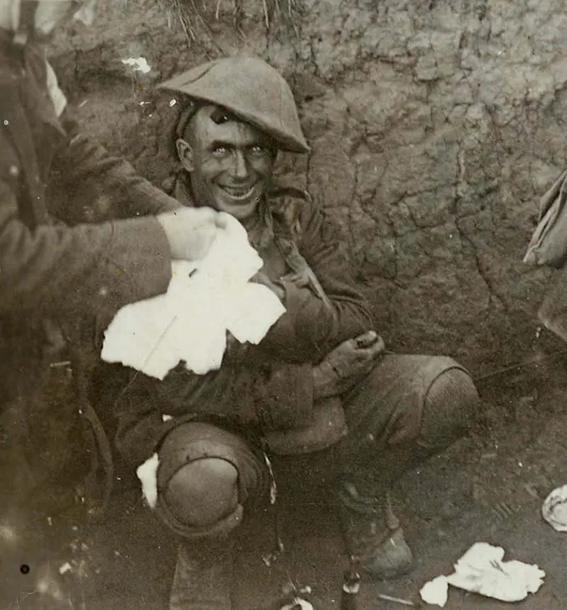 Black and white photograph of a World War I soldier with a thousand-yard stare, showing signs of shell shock