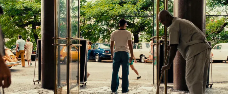 The film utilizes the architecture of Recife to create a sense of sun-drenched claustrophobia and paranoia